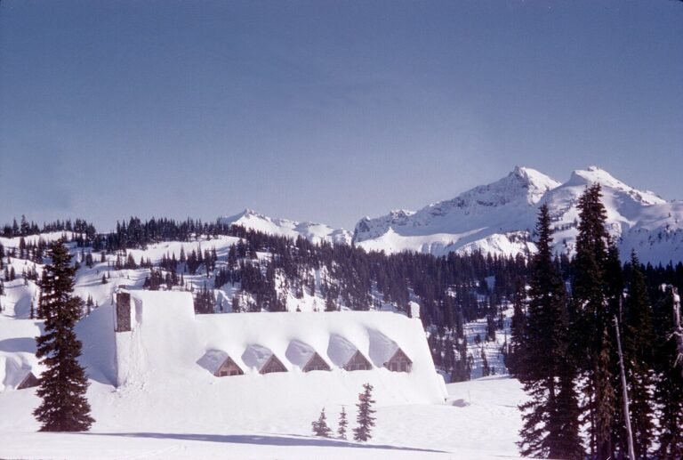 Paradise Inn buried in deep snow below Mount Rainier